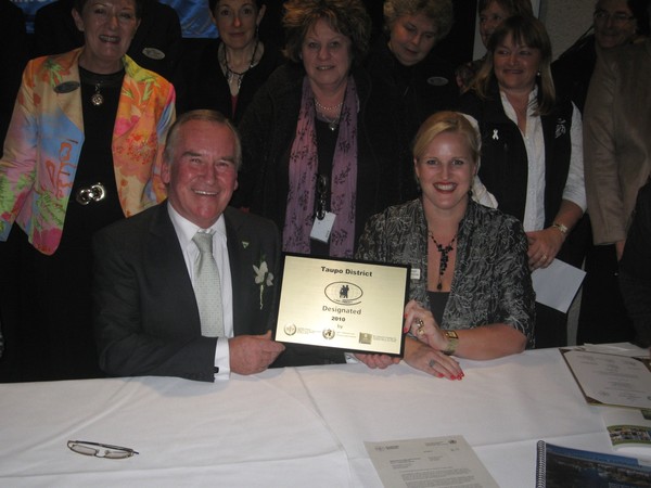 Mayor Rick and Louise Upston with WHO designation
